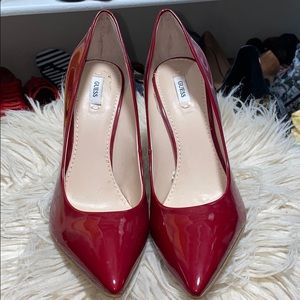 Red patent leather pumps